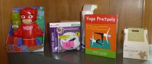 lot 61 image: New bubble blower, smoke alarm, yoga pretzels, aloe grow kit