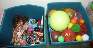 lot 104 image: Tote of balls, most are new, and a tote of barbies and other toys