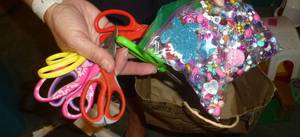 lot 124 image: Lot of misc - scissors, beads, seat cushions, rug, photo frames, pipe cleaner, basket, shells