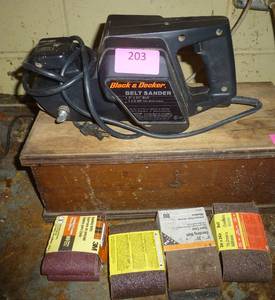 lot 203 image: Black and Decker belt sander 3 inch