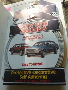 lot 253 image: Car body molding and plugs