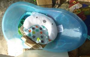 lot 259 image: Misc lot of whats left, kids scissors, infant basket, toys, wind sock, new paint brushes and rollers