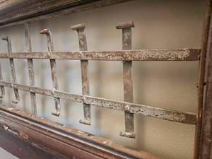 lot 75 image: Primitive Wrought Iron barred Window Frame