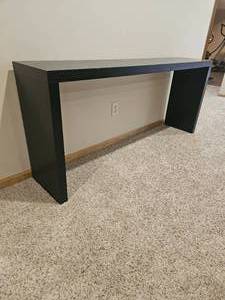lot 22 image: Minimalist Matte Black Sofa Console