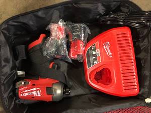 Milwaukee M12 FUEL SURGE 12V Lithium-Ion Brushless Cordless 14 in. Hex Impact Driver Compact Kit wTwo 2.0Ah Batteries, Bag Customer Returns See Pictures