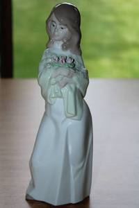 lot 6 image: Lladro Porcelain Figurines - Girl with Flowers and Rocking Horse