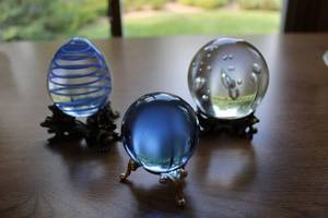 lot 10 image: Collection of Decorative Glass Orbs with Stands