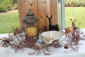 lot 38 image: Rustic Decorative Lot Lantern with Candle, Bowls, Deer Candle Holders, and Garland