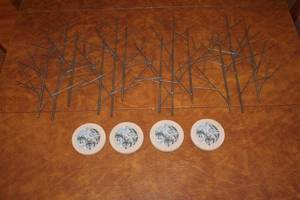 lot 50 image: Metal Tree Wall Art & Wolf Design Coasters Lot