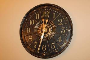 lot 59 image: Vintage Wall Clock with Metal Plant Stand and Faux Fern