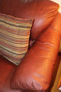 lot A-93 image: Brown Leather Sofa and Armchair Set with Ottoman and Cushions