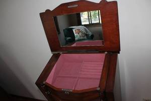 lot B-100 image: Vintage Wooden Jewelry Armoire with Mirror and Multiple Drawers