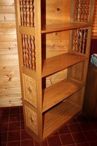 lot 131 image: Tall Wooden Shelving Unit with Decorative Carvings
