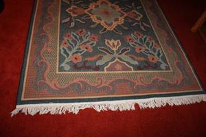 lot 148 image: Floral Multicolor Area Rug with Fringe Edges