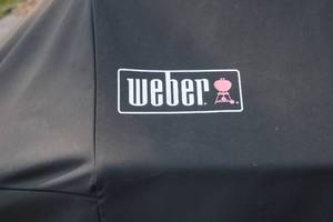 lot A-155 image: Weber Spirit Gas Grill with Cover and Grill Toppers (Reserve set at $200)