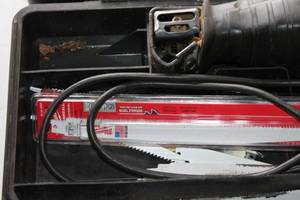 lot B-165 image: DeWalt Reciprocating Saw with Case and Saw Blades