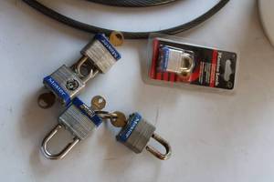lot 184 image: Assorted Master Lock and Tru-Bolt Padlocks with Lock Cable Set