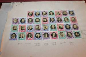 lot 202 image: The New World Wide Postage Stamp Album with Assorted Stamps