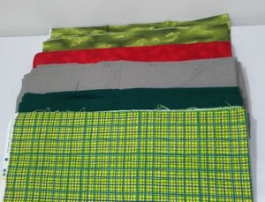 Green, Grey, Reds Flannel Fabric. Approx. 10 Yds.