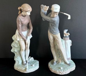 lot 84 image: Lladro Porcelain Figurine Golfer 4824 and Lladro Porcelain Woman Golf Player Figurine 4851