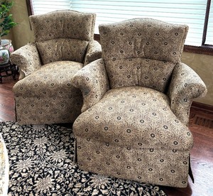 lot 108 image: Pair of Jessica Charles Bristow Swivel Rocker Upholstered Armchairs