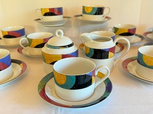 lot 239 image: Mikasa Currents Teacups and Saucers and Cream and Sugar Set