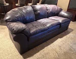 lot 213 image: Purple Leather Sofa by Sealy