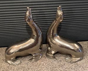 lot 8 image: Pair of Awesome Decorative Chrome Seals