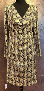 lot 362 image: Lovely St. John Skirt and Shirt Set