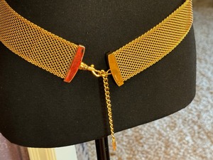 lot 440 image: St. John Knits Logo 18k Triple Plate Mesh Chain Belt  ST. JOHN Vintage Gold Mesh Link Adjustable Belt.