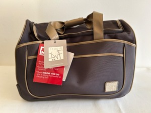 lot 65 image: Vintage New Old Stock Diane Von Furstenburg DVF Studio Rolling Duffle Bag Suitcase