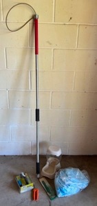 lot 159 image: DOG CATCHER & Care Items Including a Noose, a Brand New Furminator, Clippers & More