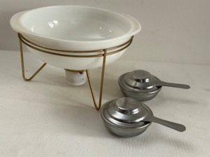 lot 244 image: Vintage MCM Atomic Space Aged PYREX Milk Glass Casserole on a Gold Warming Stand 
