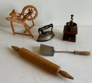 lot 259 image: Antique Childs Toys Miniature Replicas Including a Sad Iron, a Coffee Grinder, a Spinning Wheel & Utensils