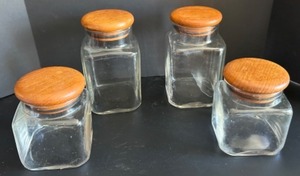 lot 277 image: 4-piece set of vintage Danish Modern Style Teak Lid Glass Canisters