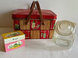 lot 353 image: Vintage Kitschy Metal Picnic Basket with Wooden Handles, Glass Canister and 1950s Metal Tin Recipe Box
