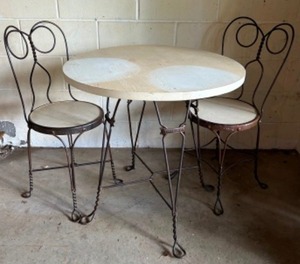 lot 373 image: Antique Ice Cream Parlor Table with Matching Chairs Accented in Wrought Iron and Wood