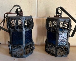 lot 420 image: MCM Spanish revival Blue Glass Hanging Pair of Wall Lamps W Black Wrought Iron Work