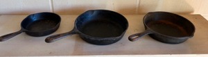 lot 425 image: Vintage CAST IRON Skillet Set of Three Various Sizes with Various Makers 6, 8 & 10