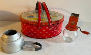 lot 451 image: Vtg MCM Lot of Litho Tinware Including an Oval Pennsylvania Dutch Folk Art  Tin, a Nut Grinder and a Foley Aluminum Sifter