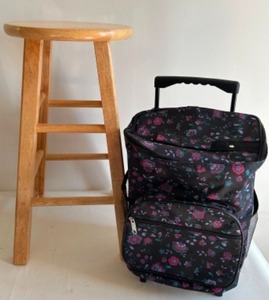 lot 328 image: Useful Blond Wood Classic Stool and Rolling Weekend Travel Bag