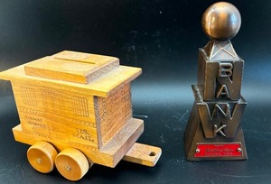 lot 391 image: Vintage Wood Railway US Mail Car Piggy Bank and NorthWestern National Bank Weather Ball Coin Collector