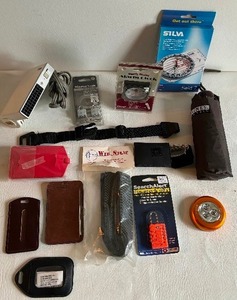 lot 302 image: Must Haves for The Avid TRAVELER Compass, Suitcase Locks, Travel Alarm Clock & More