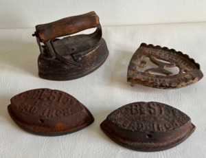 lot 110 image: Antique Asbestos SAD IRON Set with Wood Handled Cradle, 2 Cast Iron Cores and a Footed Rest - Qty 4 Pieces