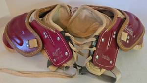 lot 23 image: Vintage RAWLINGS Snubber Football Shoulder Pads