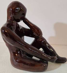 lot 18 image: Vintage MCM Ceramic Sitting Figure Statue