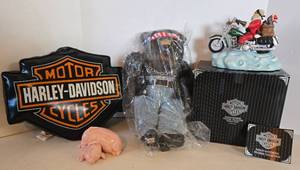 lot 54 image: HARLEY DAVIDSON Collectibles, Biker Santa, Bear, Pillow, & Pinks Hogs