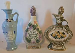 lot 82 image: 3 Collectible JIM BEAMS Designer Bottles 