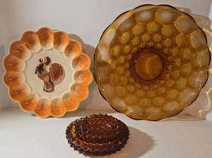 lot 116 image: Vintage Heisey Amber Platter, Deviled Egg Tray, & Stacking Ashtrays 