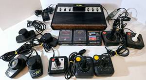 lot 128 image: Vintage ATARI CX-2600 Video Game System  7 Games 